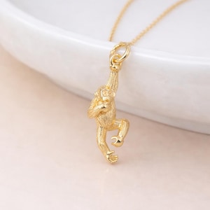 Spersonalizowany naszyjnik z zawieszką w kształcie małpki z pozłacanego srebra próby 925