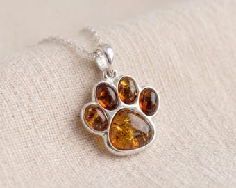 Personalised Baltic Amber Paw Print Pendant Necklace In Sterling Silver