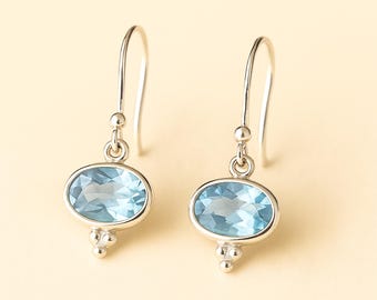 Sterling Silver Oval Blue Topaz Drop Earrings