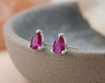 Pear Cut Ruby Stud Earrings in Sterling Silver