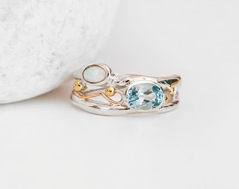 Sterling Silver Blue Topaz And White Opal Ring