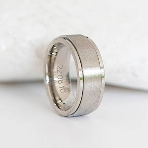 Gepersonaliseerde zilveren roestvrijstalen draaibare ring