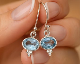 Sterling Silver Oval Blue Topaz Drop Earrings