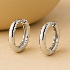 Aros Huggie gruesos de plata de ley