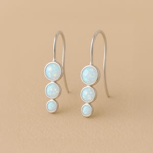 Trio de boucles d'oreilles en argent sterling avec opale blanche