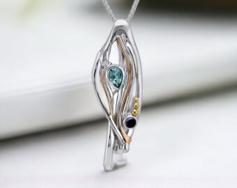 Genuine Blue Topaz and Iolite Necklace in Sterling Silver