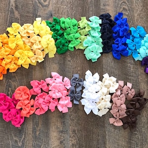 Solid color piggy tail hair bows,