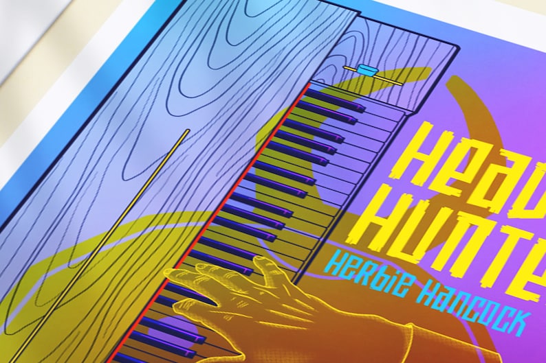 May include: A yellow and blue poster with the text "Heavy Hustle" and "Herbie Hancock" in a bold, blocky font. The poster features a hand playing a keyboard with a wooden case.