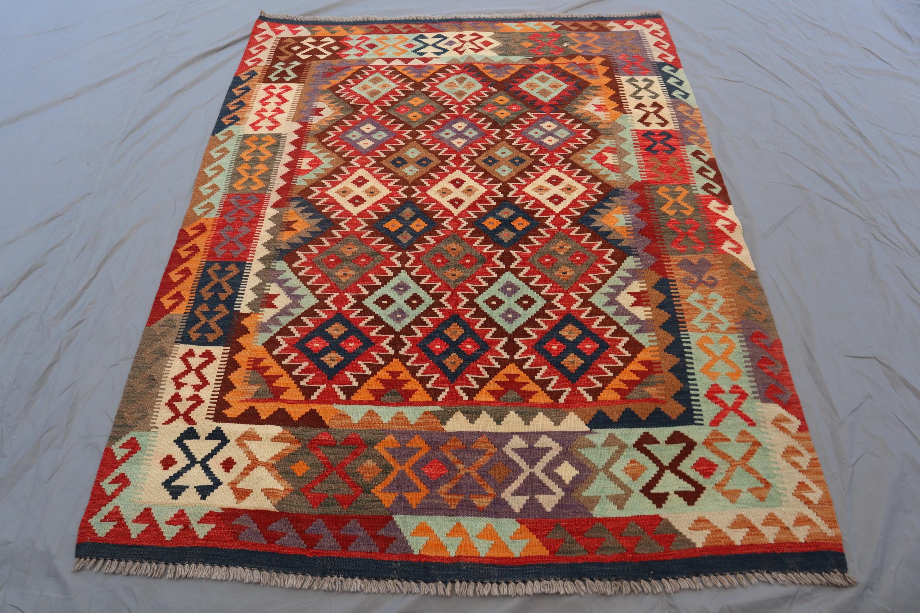 Vintage Afghan Kilim Rug: 5x7 Handwoven Wool, Tribal Geometric