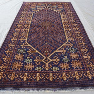 Antik afghansk baluchmatta i ull, geometrisk tribaldekor (12,5x18,3 m)