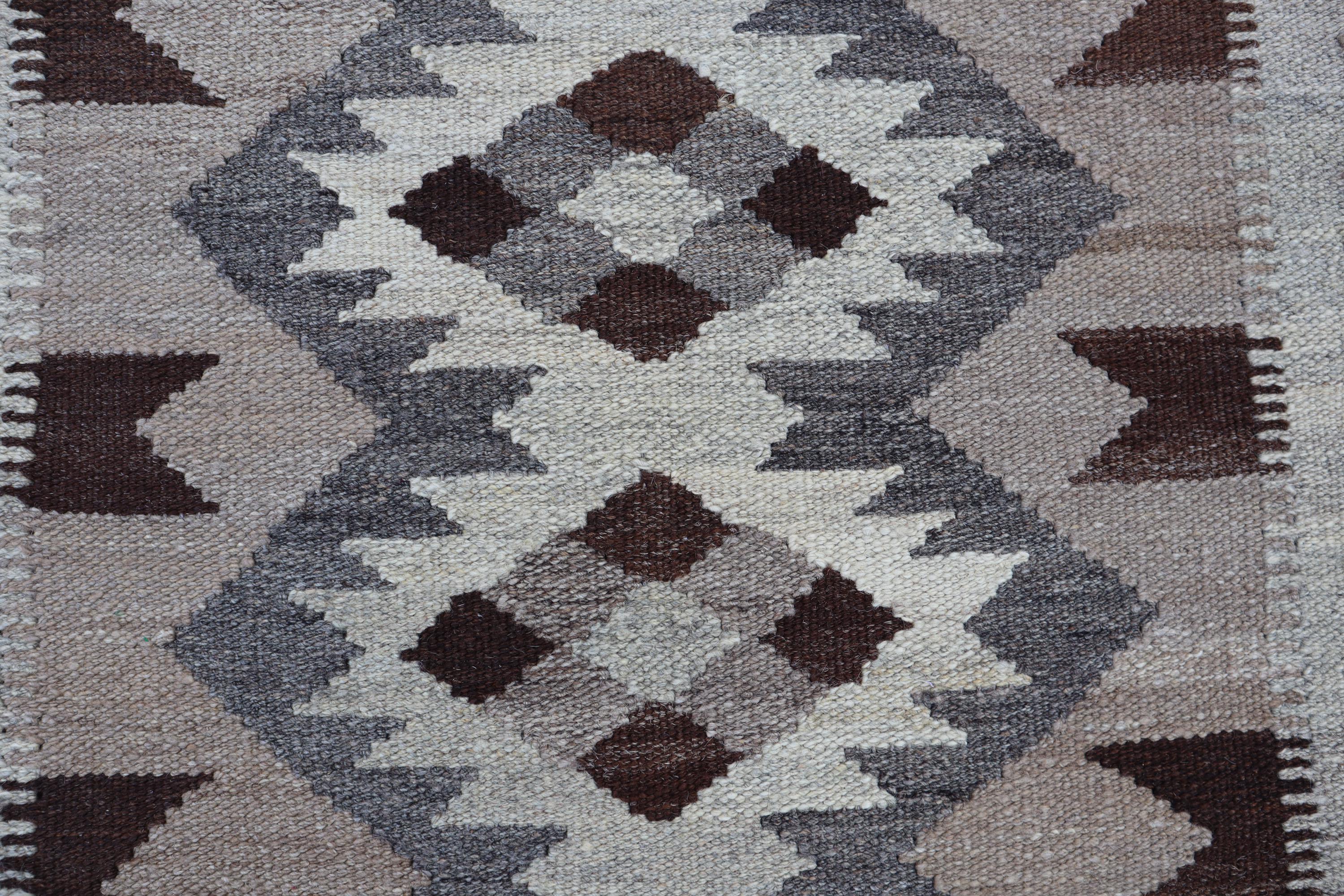 手織りウールキリムランナーラグ – 落ち着いた雰囲気のボヘミアン風