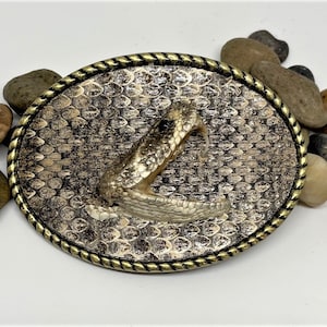 Rattlesnake Belt Buckle with Head Inlay  Usually, item(s) in stock. IF not in stock, please anticipate a 2-3 week processing time.