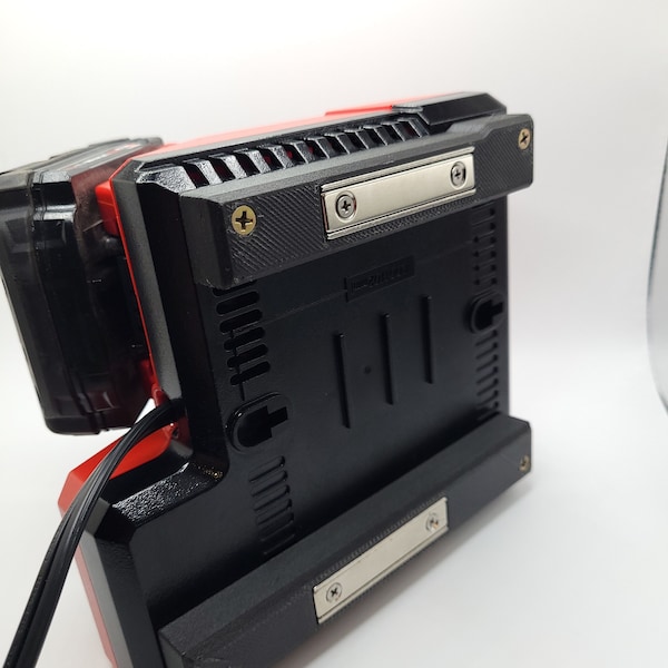 Milwaukee M12 M18 Charger Mount, Cat. No. 48-59-1812, Uses Two Neodymium Bar Magnets for Strong Hold on Metal Surface