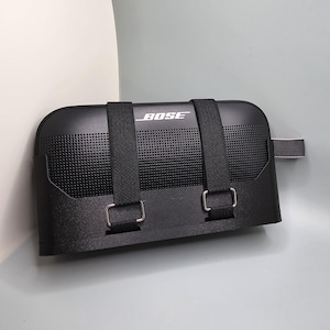 Bose Soundlink Flex-luidsprekerhouder, maakt gebruik van sterke, krachtige neodymiummagneten voor bevestiging aan magnetisch metalen oppervlak, verticale of horizontale balk