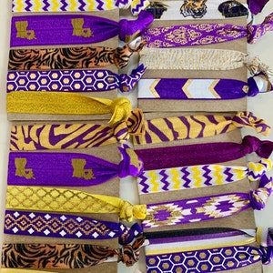 LSU Hair Ties, Set of 6 Hair Ties in LSU purple and gold! Wear on your wrist until you need to put your hair up. Tiger fans will love this!