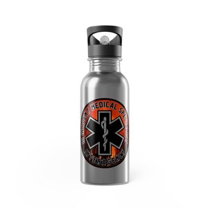 May include: A silver water bottle with a black lid and a sticker that says "Incident Medical Specialist Interagency" with a red and orange background and a black star of life symbol.