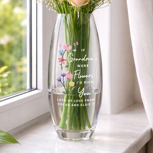 May include: A clear glass vase with a floral design and the text "If Grandma's Were Flowers I'd Pick You." The vase contains fresh flowers and water. The text "Lots of love from Oscar and Elsie X" is also visible.