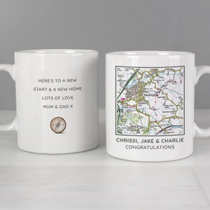 May include: White ceramic mug featuring a map of Haslington, England, with the text "Chriss, Jake & Charlie Congratulations". The reverse side of the mug displays the message "Here's to a new start & a new home, lots of love, Mum & Dad X" and a compass.