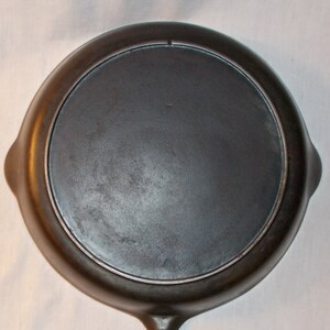 A recent restoration - one-notch Lodge hammered deep skillet and lid! :  r/castiron