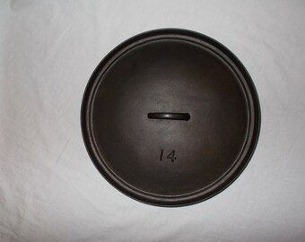 Early Lodge #14 camp oven lid with raised number