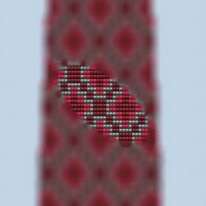 Puede incluir: Una corbata roja con estampado con un pequeño diseño estampado rojo, blanco y gris en el centro.