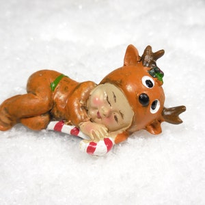 Miniature Baby Elf Sleeping in Reindeer Pajamas Figurine ~ Winter Fairy Garden Accessories ~ Christmas Dollhouse Miniatures