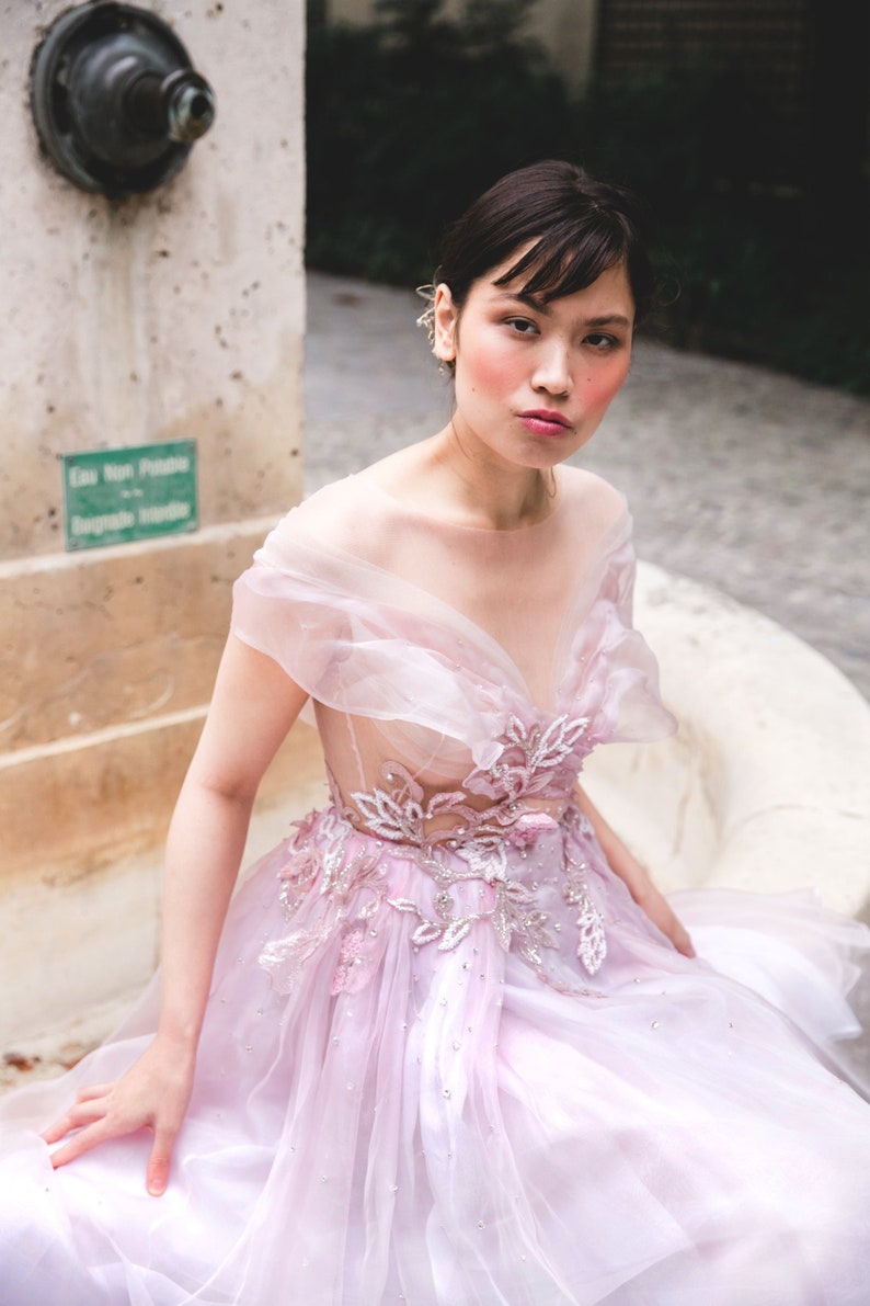 Light pink wedding dress with crystals image 1