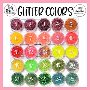 May include: A collection of 25 small jars filled with different colors of glitter. The jars are arranged in a grid of five rows and five columns. Each jar is labeled with a number from 1 to 25.