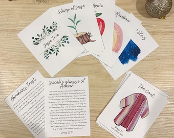May include: A set of Christmas-themed cards with illustrations and text. The cards feature images of a rainbow, a star, an apple, a tree stump, a tree, a coat, and a text card with the title "Jacob's glimpse of Heaven".