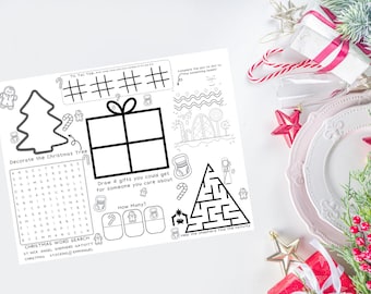 May include: A black and white printable Christmas activity sheet with a tic-tac-toe game, a Christmas tree to decorate, a word search, a maze, and a gift drawing activity. The sheet includes the text "Tic Tac Toe", "Decorate the Christmas Tree", "Christmas Word Search", "Draw 4 gifts you could get for someone you care about", and "How Many?"