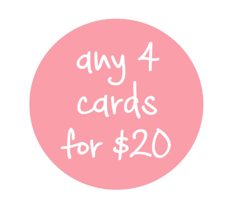 May include: A light pink circle with the text "any 4 cards for $20" written in white script. The text is centered within the circle, which is set against a white background.