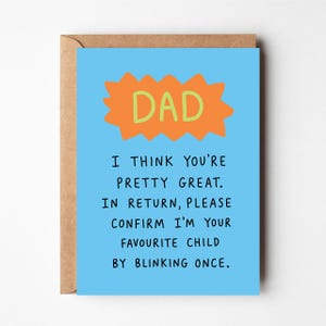 May include: A light blue greeting card with an orange starburst shape containing the word DAD in light green. Below, black text reads: I THINK YOU'RE PRETTY GREAT. IN RETURN, PLEASE CONFIRM I'M YOUR FAVOURITE CHILD BY BLINKING ONCE. The card is in a brown envelope.