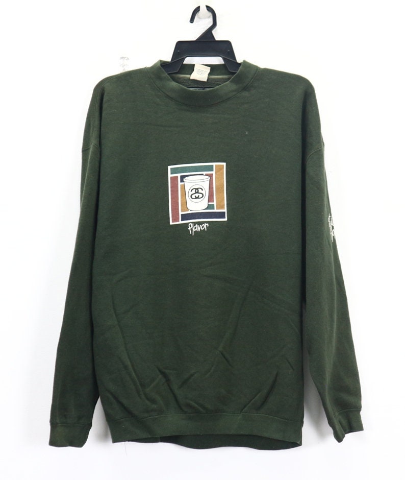 green stussy jumper