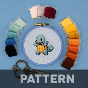 May include: Cross stitch pattern for a blue and yellow Squirtle Pokemon character. The pattern includes a variety of coloured embroidery floss in plastic bobbins.