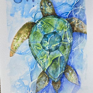 May include: A watercolor painting of a sea turtle swimming upward. The turtle has a green and brown shell with geometric patterns. The background is a wash of blue and light blue with white lines representing water ripples and bubbles.