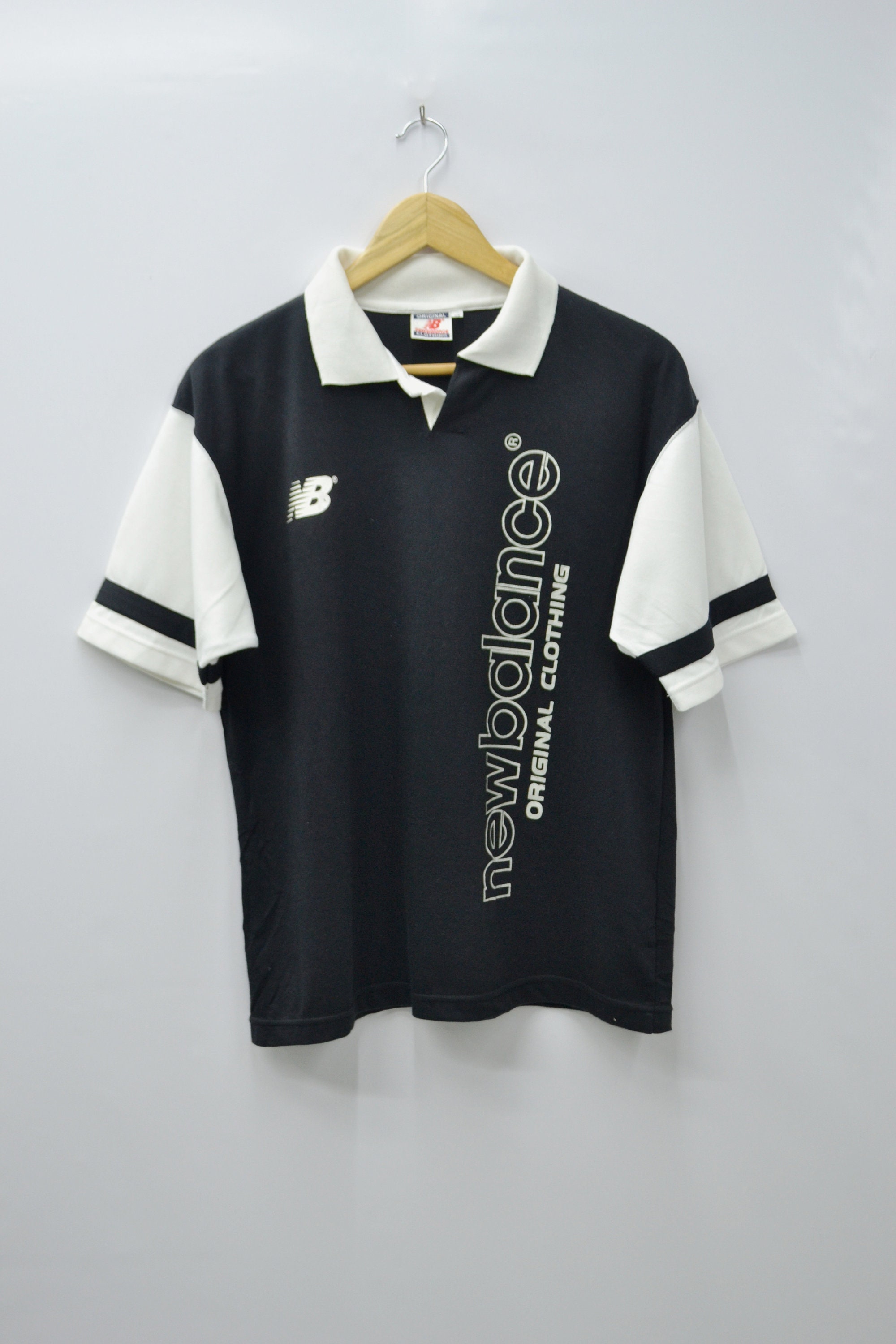 new balance polo