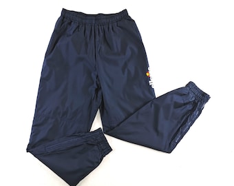 ellesse tracksuit pants price