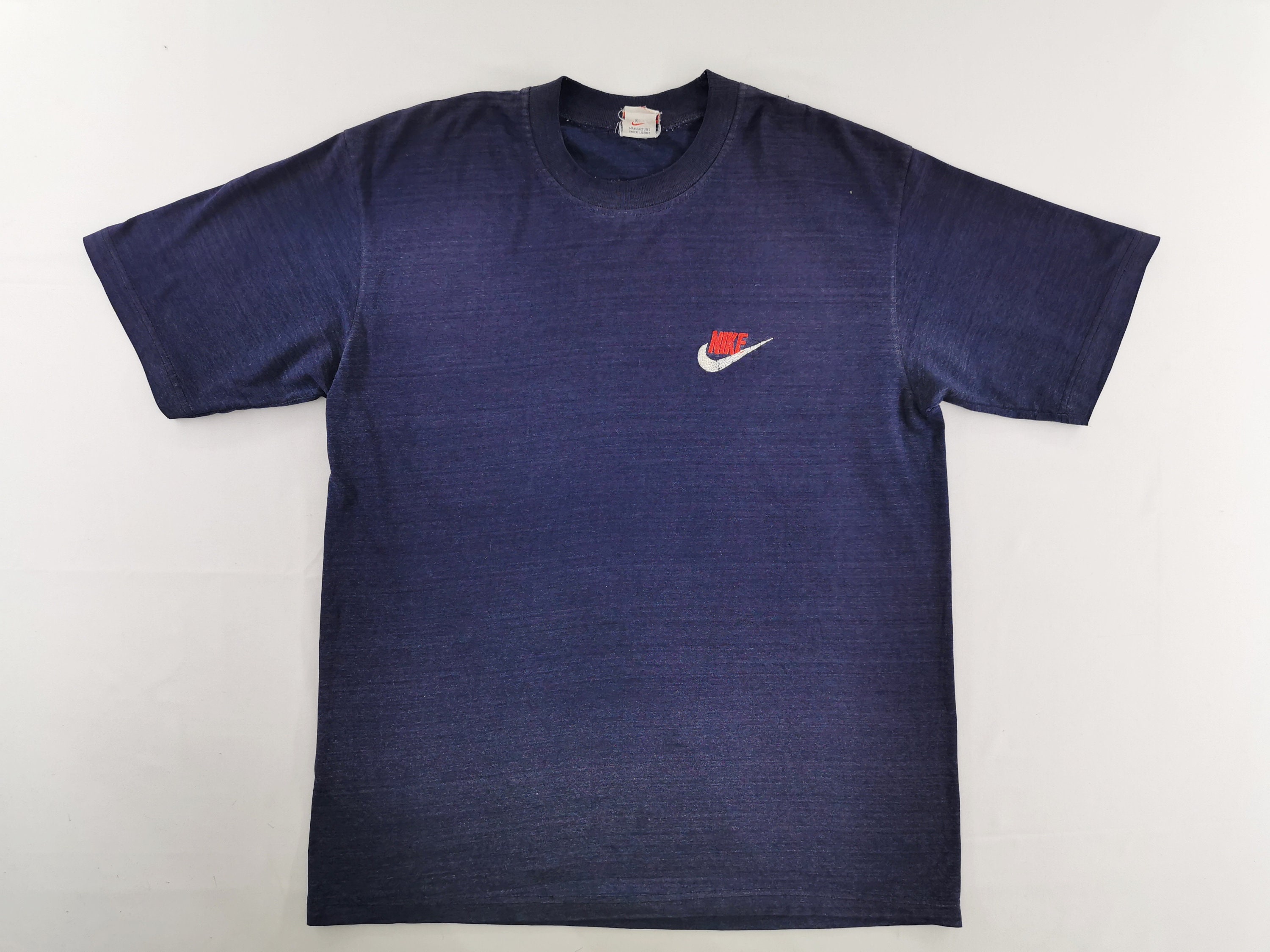 brown nike shirt vintage