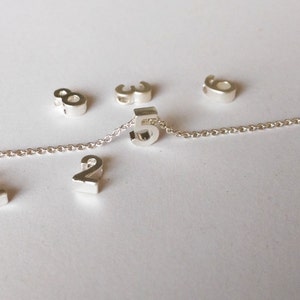 7X5mm Mini 3D Number Charm, Matte Silver Number charm,  Can Add to necklace or Bracelet, Personalized Lucky Number Charm, Bead