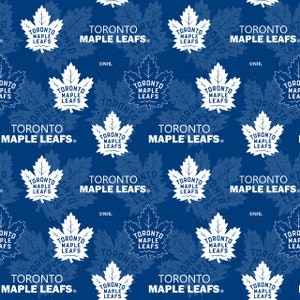 May include: A blue and white repeating pattern featuring the Toronto Maple Leafs logo. The logo is a white maple leaf with the words "Toronto Maple Leafs" inside. The background is a dark blue with a distressed texture.