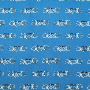 May include: A blue fabric with a repeating pattern of the Orlando Magic basketball team logo. The logo features a basketball, a star, and the words "Orlando Magic".