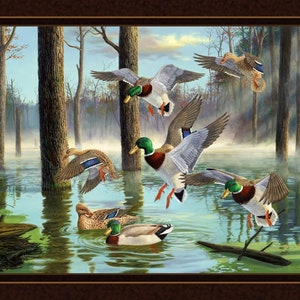 May include: A painting of a flock of mallard ducks flying over a misty forest lake. The ducks are in various positions, some in flight and some landing on the water. The lake is surrounded by trees and the sky is a light blue with some clouds.