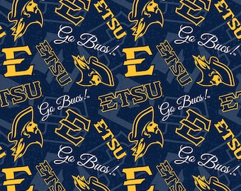 May include: A navy blue background with a repeating pattern of the words "ETSU" and "Go Bucs!" in yellow. The pattern also includes a yellow "E" and a silhouette of a pirate wearing a hat.