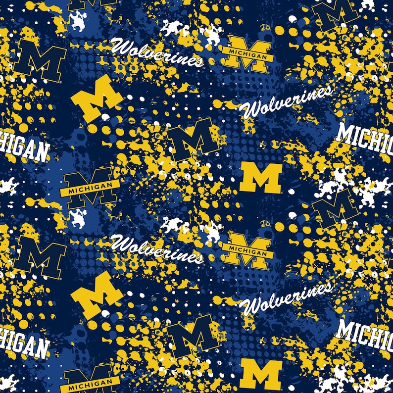 NCAA MICHIGAN WOLVERINES Splatter Print Football 100% Cotton Fabric ...