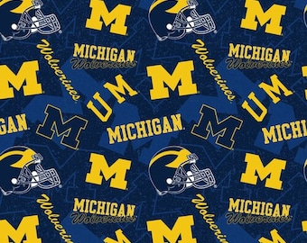 NCAA MICHIGAN WOLVERINES Watermark Print Football 100% cotton fabric material you choose length licensed Quilts