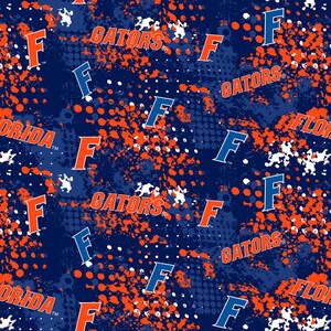 NCAA FLORIDA GATORS Splatter Print Football 100% cotton fabric material you choose length licensed Quilts