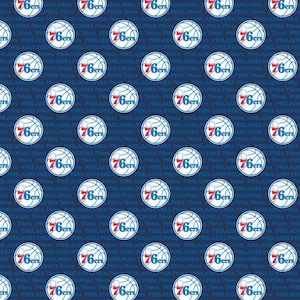 May include: A navy blue fabric with a repeating pattern of the Philadelphia 76ers logo. The logo is white with red lettering and a basketball design. The text "Philadelphia 76ers" is repeated in a smaller font size throughout the fabric.
