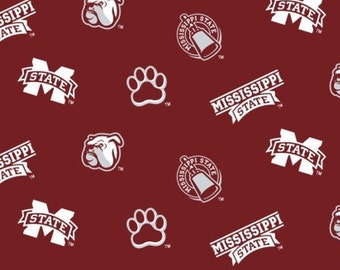 May include: A maroon fabric with a repeating pattern of white Mississippi State University logos, including the bulldog mascot, paw print, and the words "Mississippi State".