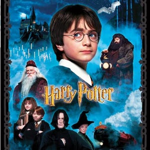 May include: A promotional image for the Harry Potter film series. The image features Harry Potter, other characters, and the Hogwarts castle. The title "Harry Potter" is prominently displayed in gold lettering. The background is a blue, cloudy sky.