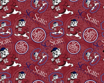 Ncaa SOUTH CAROLINA STATE BULLDOGs Watermark Print Football 100% cotton fabric material you choose length licensed Quilts, Crafts & More